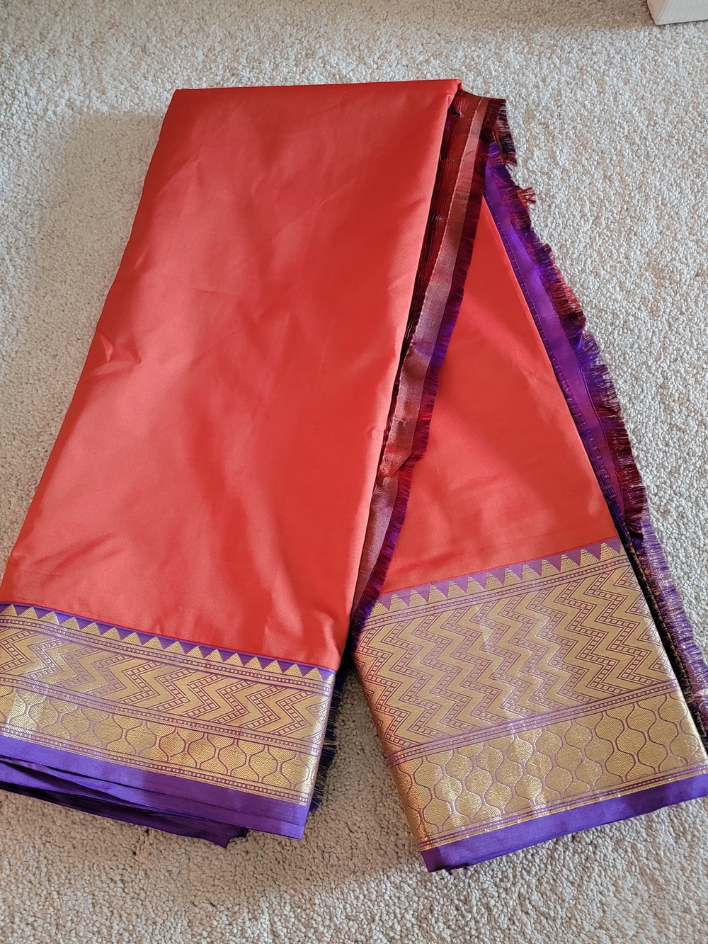 Women's Coral and Purple Woven Border Blended Silk Saree.